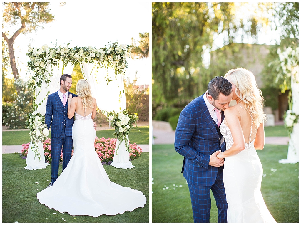 bride in two piece wedding dress and groom in custom blue suit at Arizona Biltmore