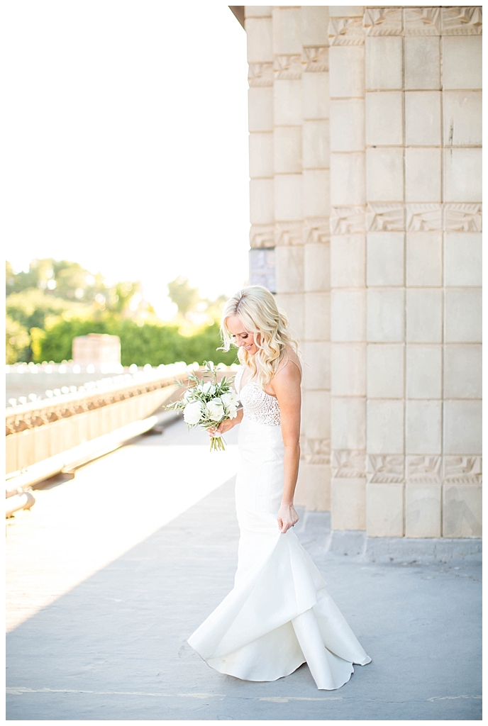 bride in two piece wedding dress on the rooftop at Arizona Biltmore