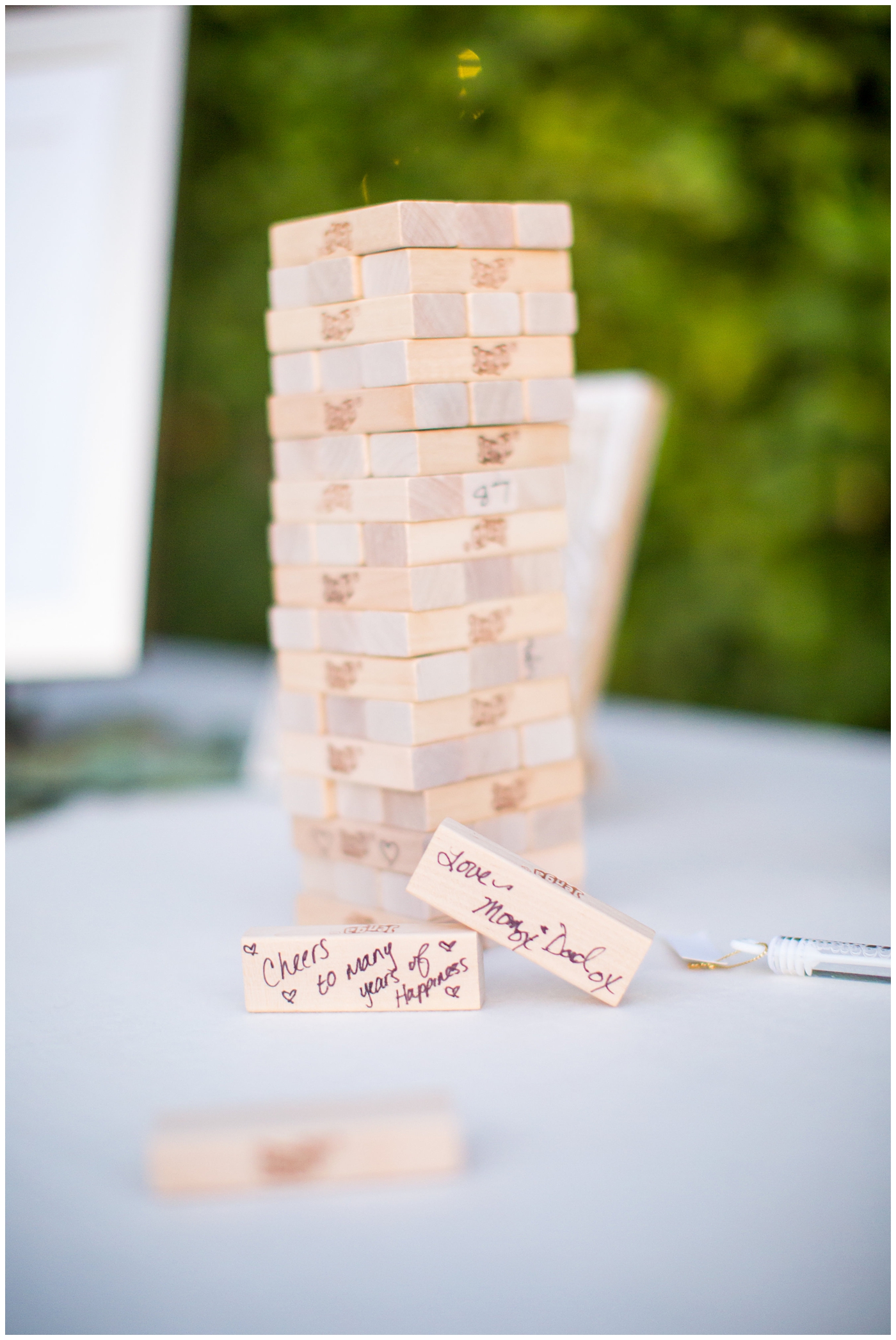 Jenga guest book at wedding reception