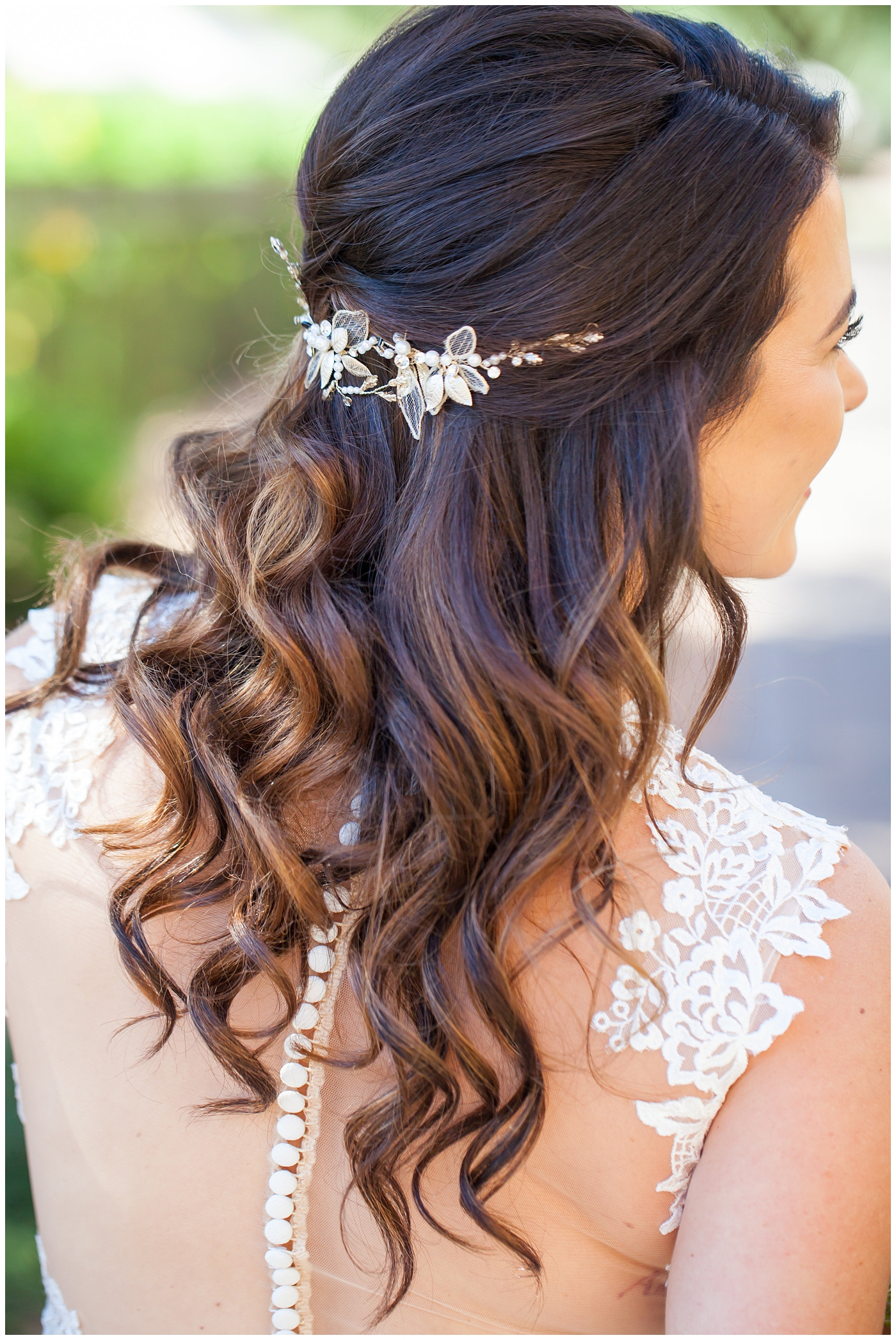 Gorgeous brunette hair do bride in Justina Alexander wedding dress 