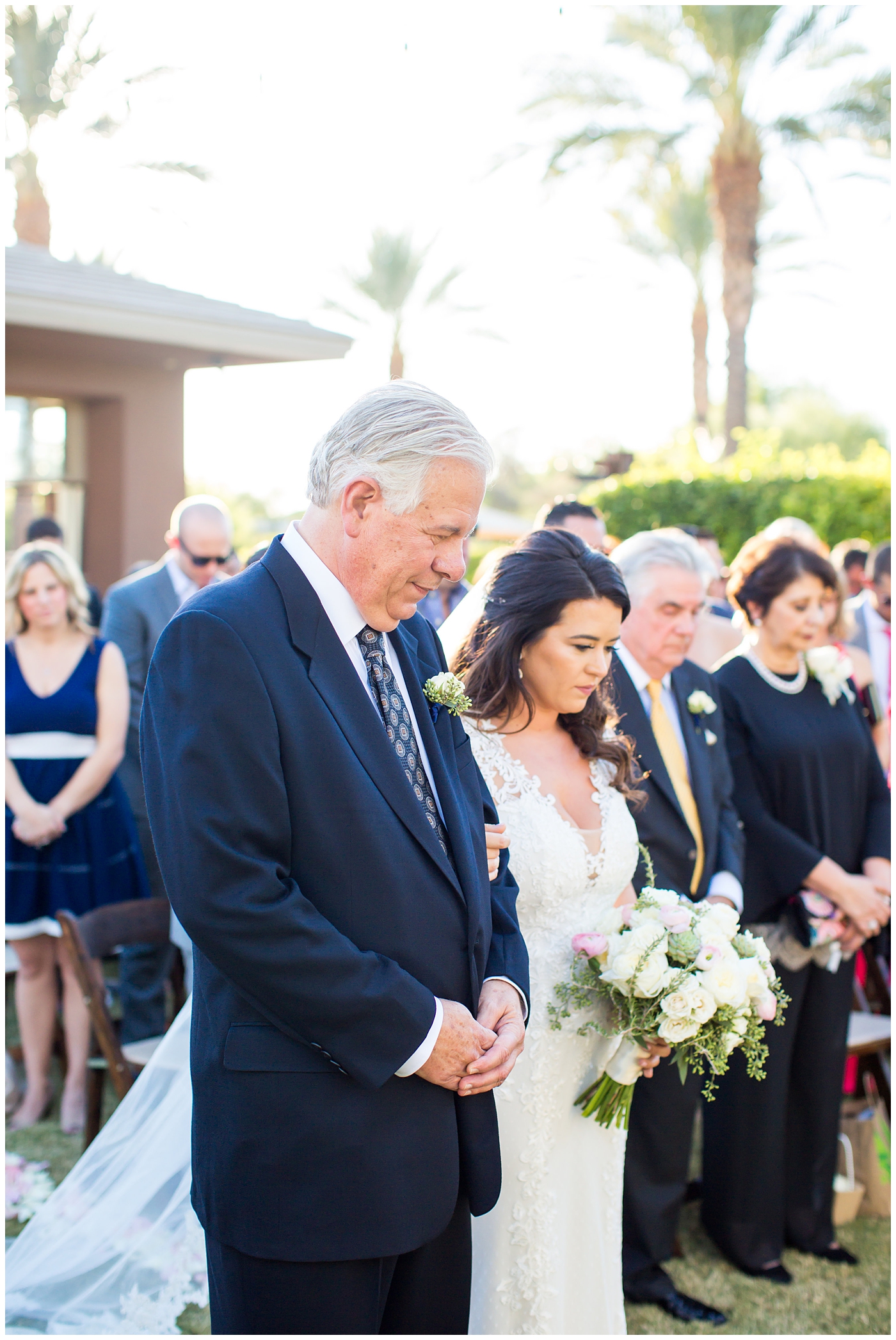 Gorgeous brunette bride in Justina Alexander wedding dress coming down the aisle at ceremony with her dad