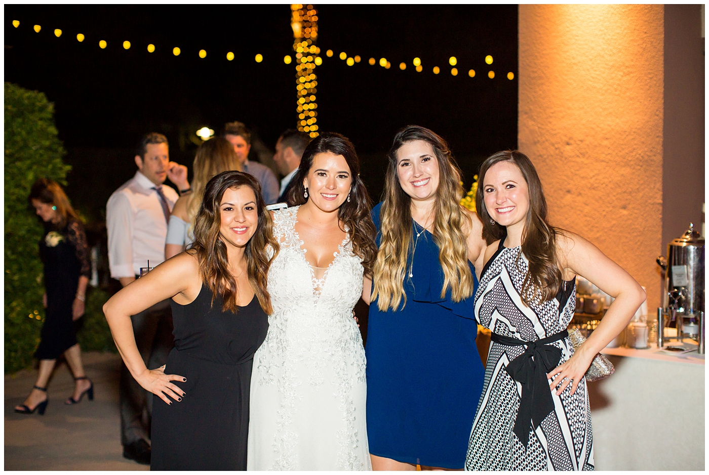 Bride with friends at wedding reception