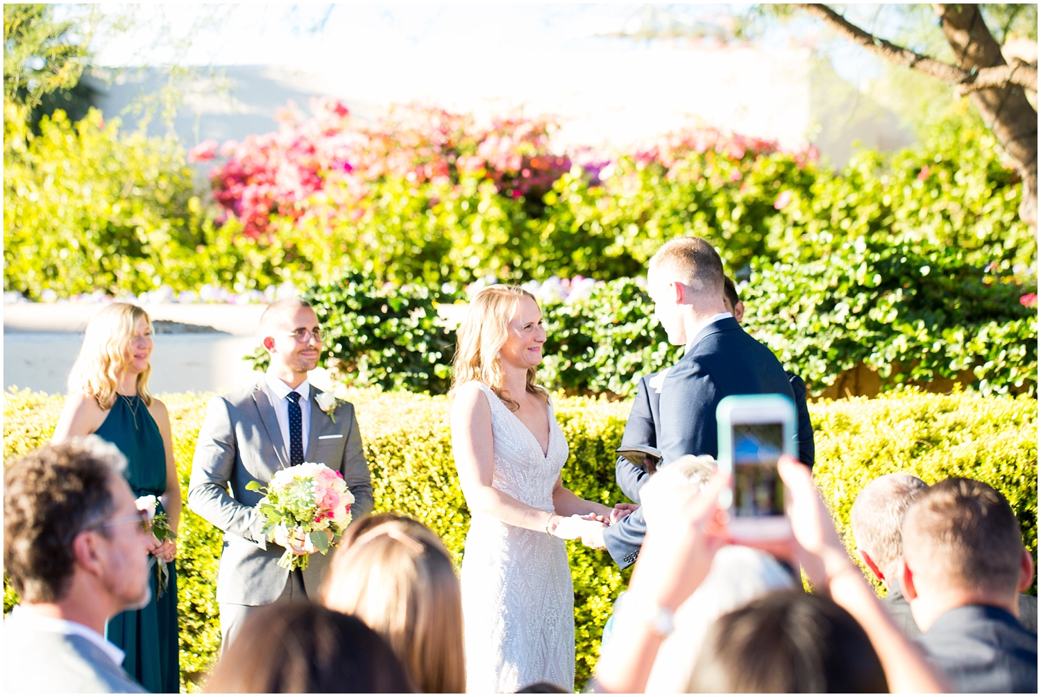 bride and groom wedding ceremony at camelback inn courtyard