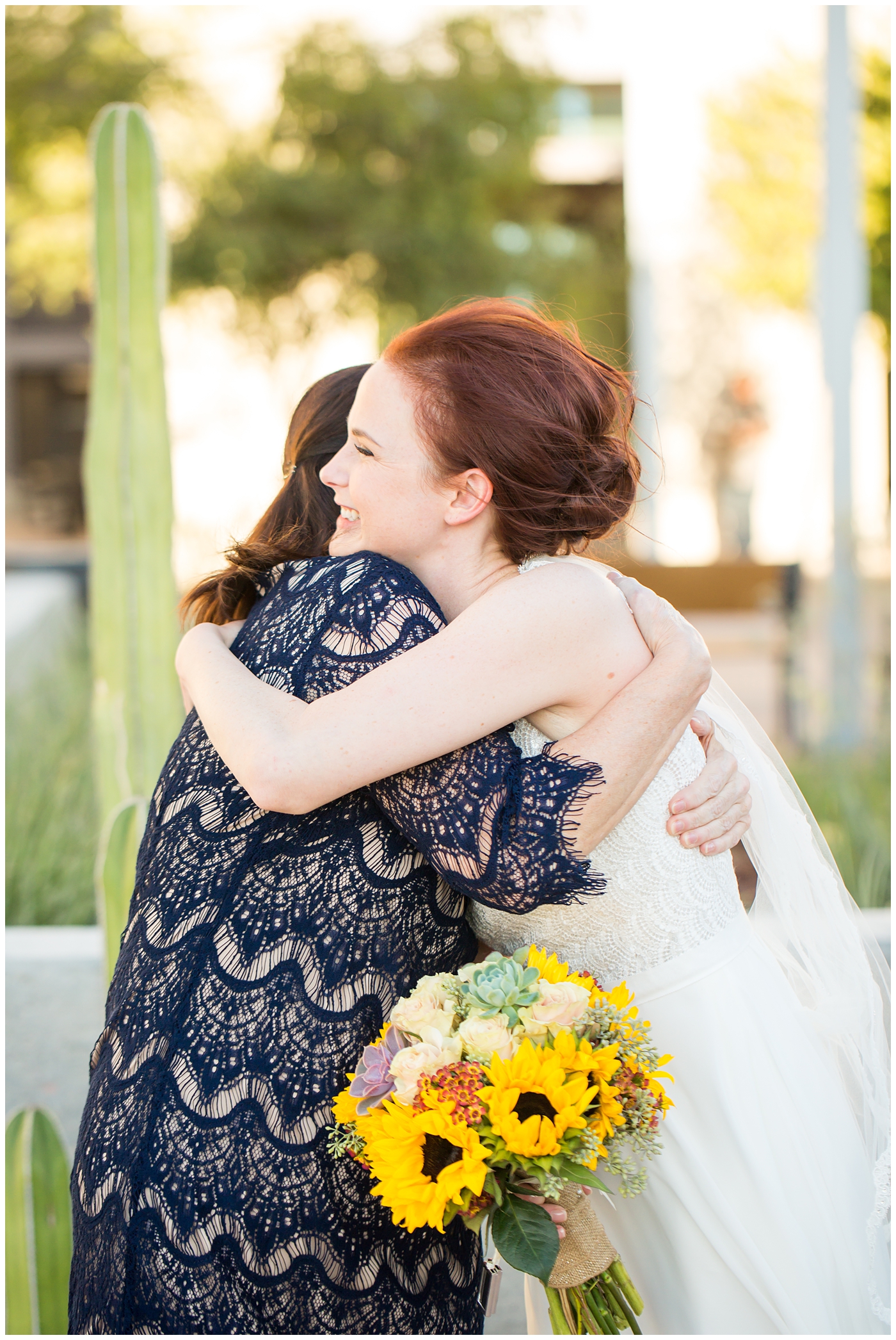 bride hugging her mother