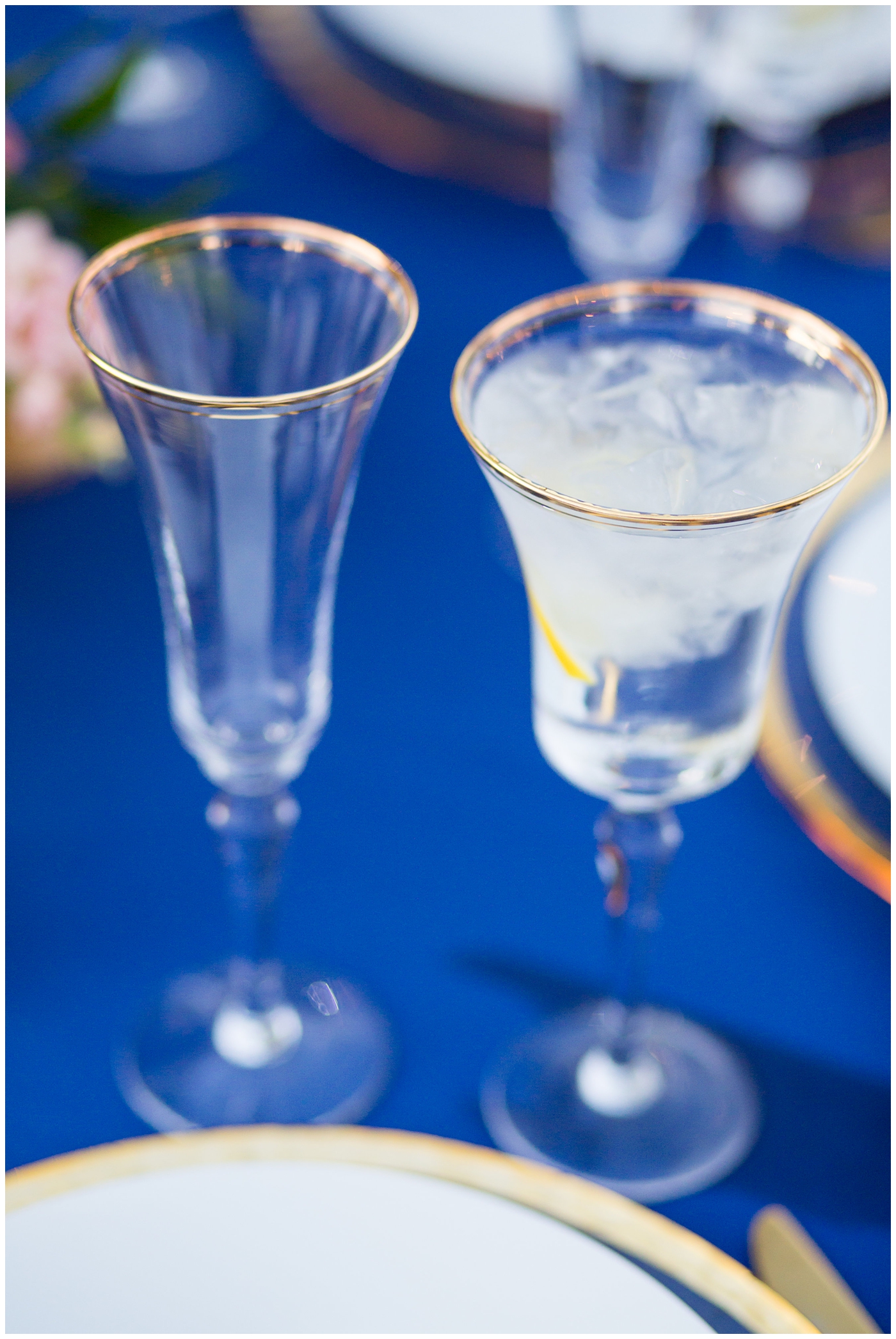 gold rim glass cups at wedding reception
