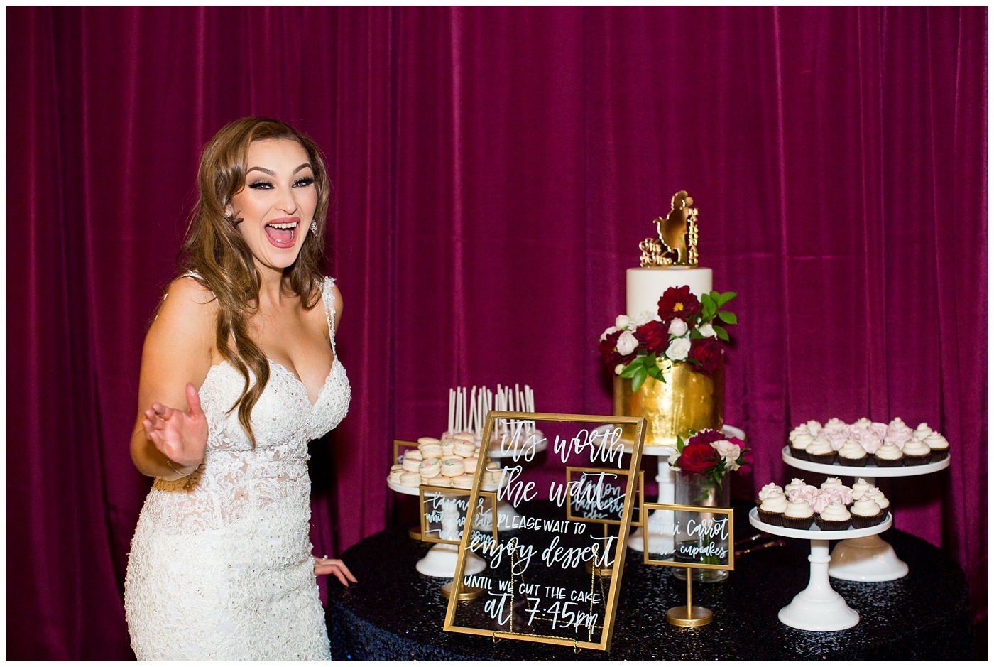 bride in morilee wedding dress with dessert table at wedding