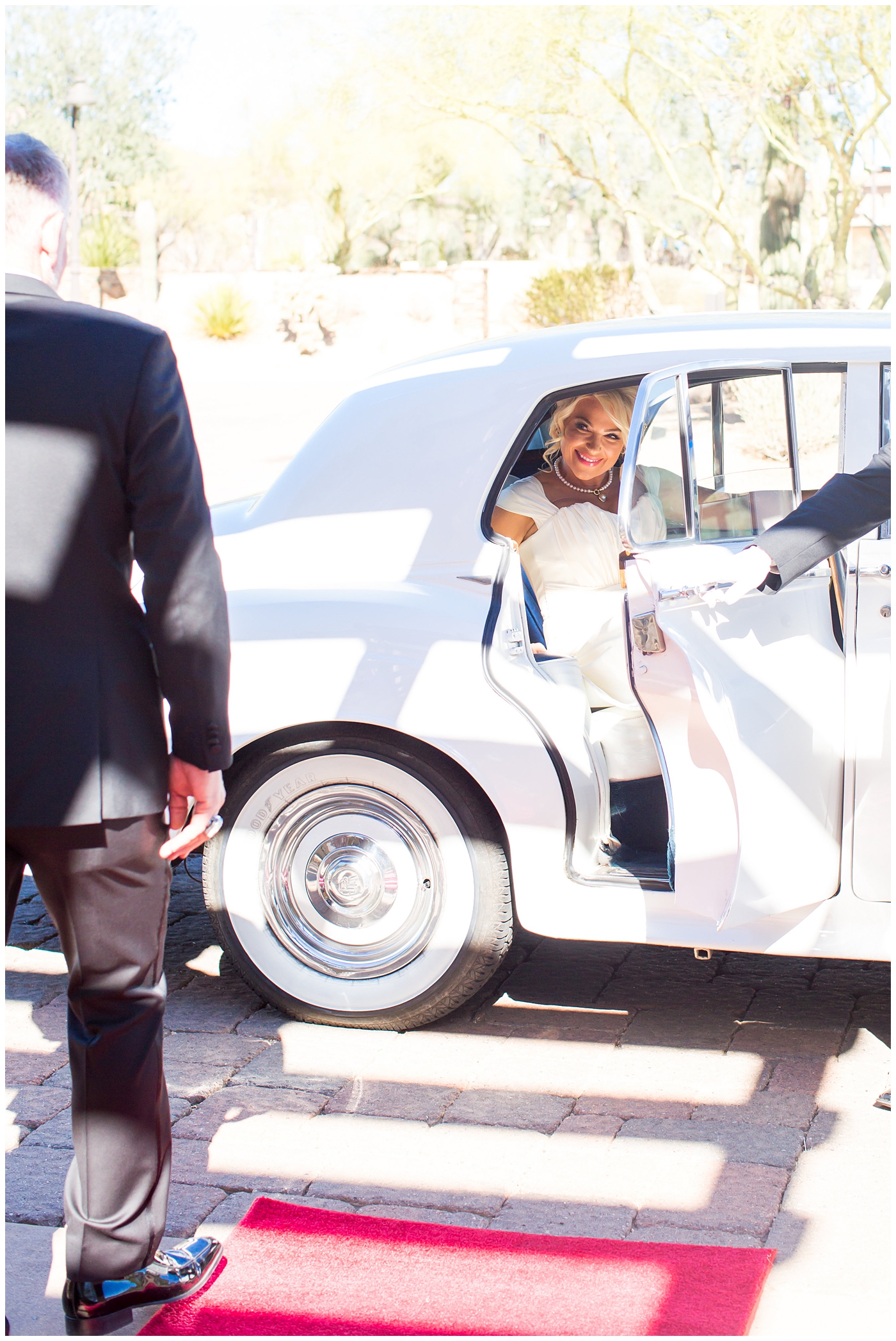 bride getting out of the car first look