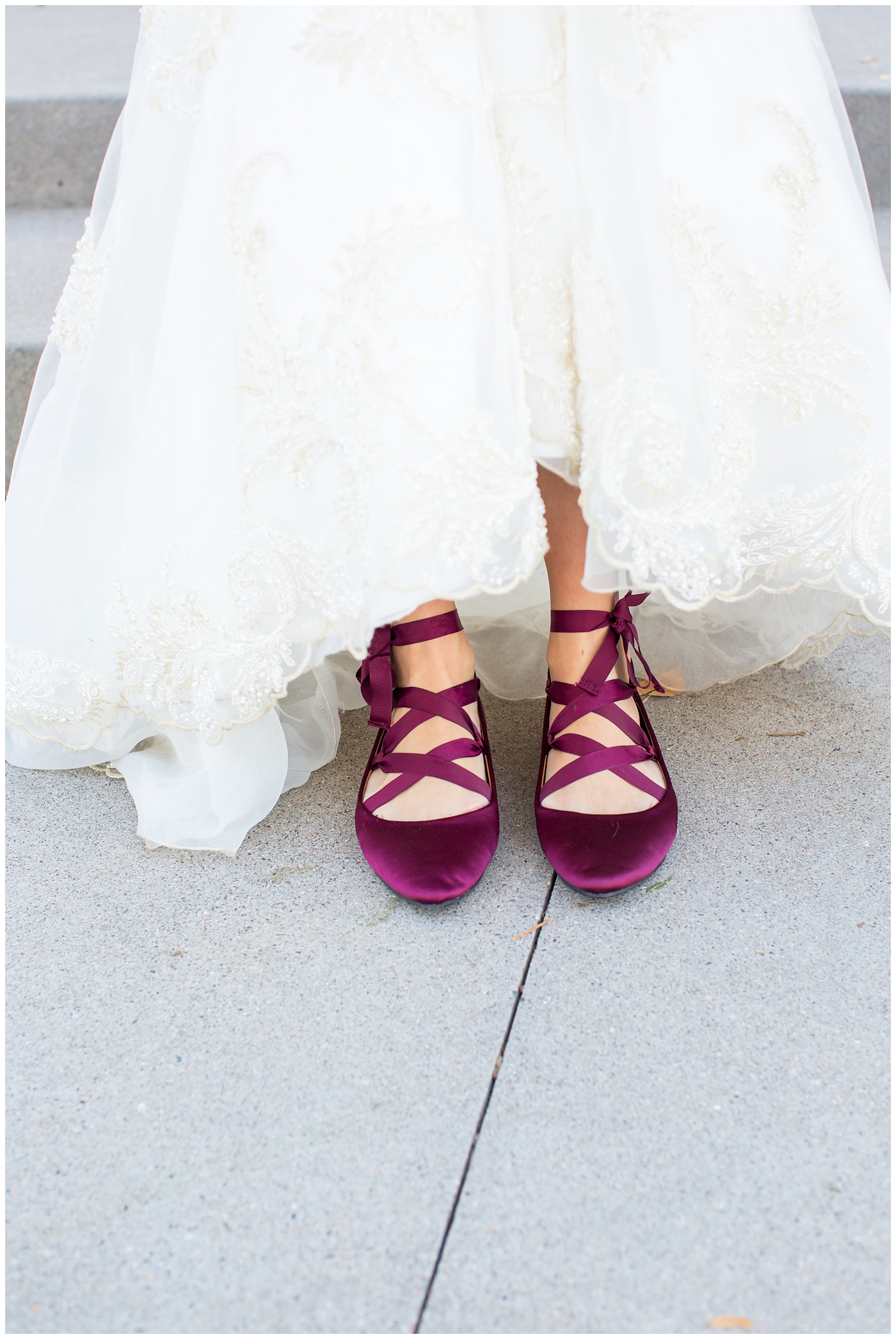 bride in sleeved lace dress with burgundy ballet tie up flats wedding day portrait at Gilbert LDS temple 