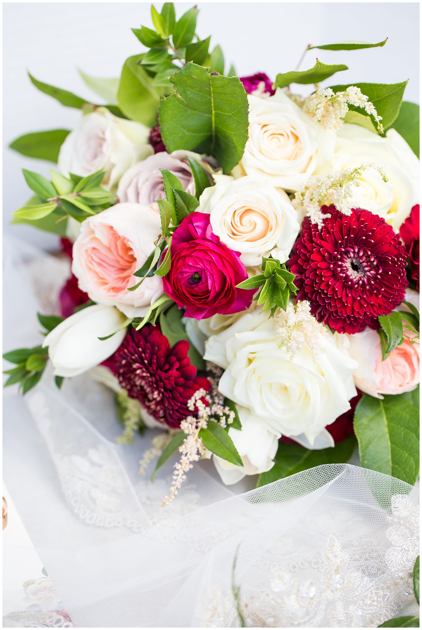 burgundy, white, and green wedding bouquet