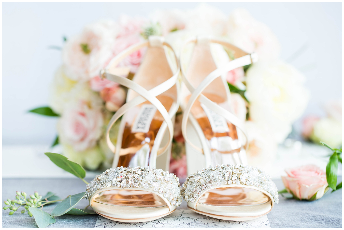 badgley mischka jewel wedding shoes with pink and white floral bouquet