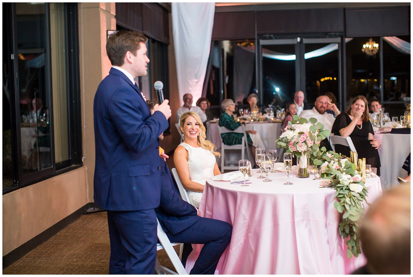 best man toast at wedding reception in ballroom