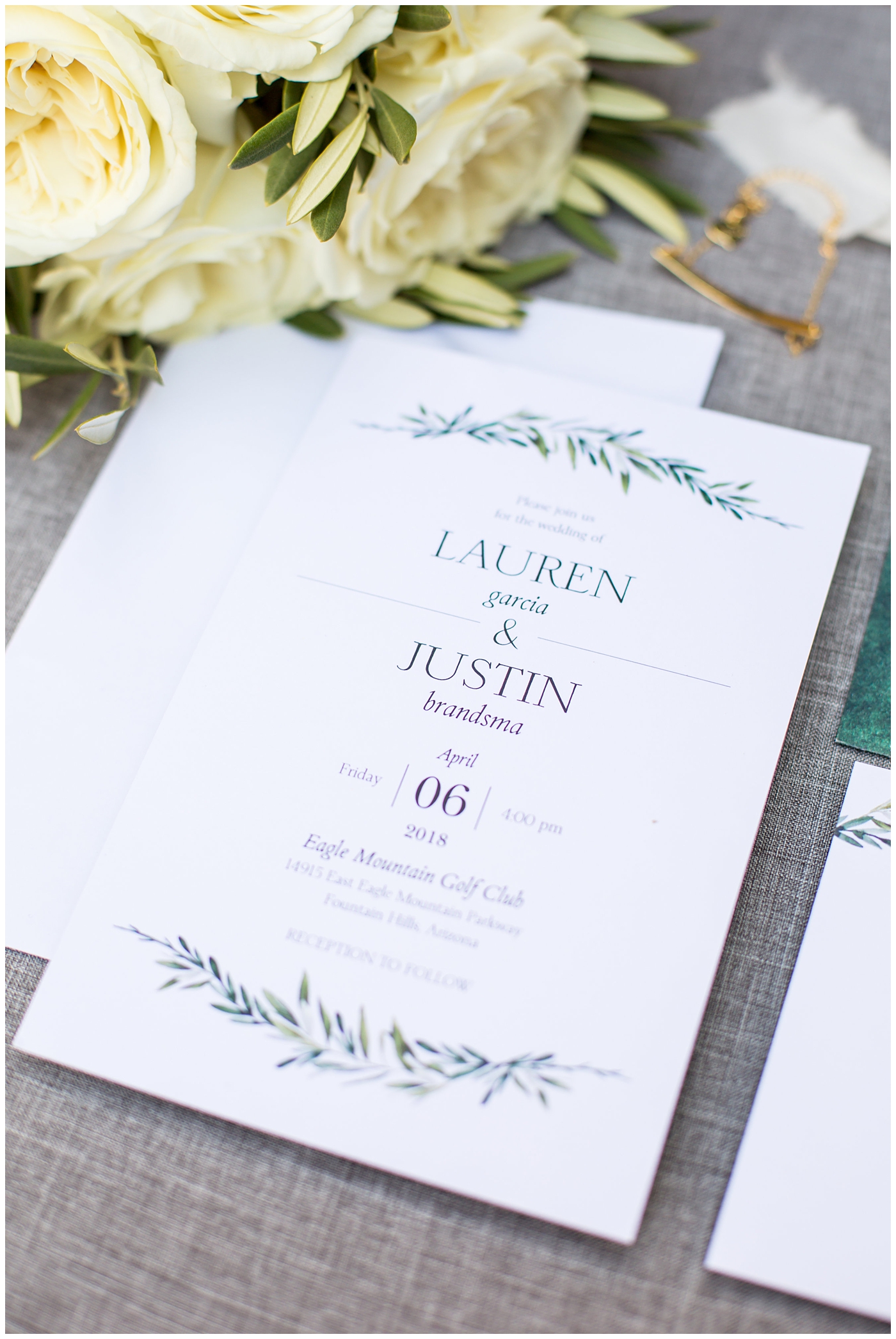 Simple white and green wedding invitation suite flat details