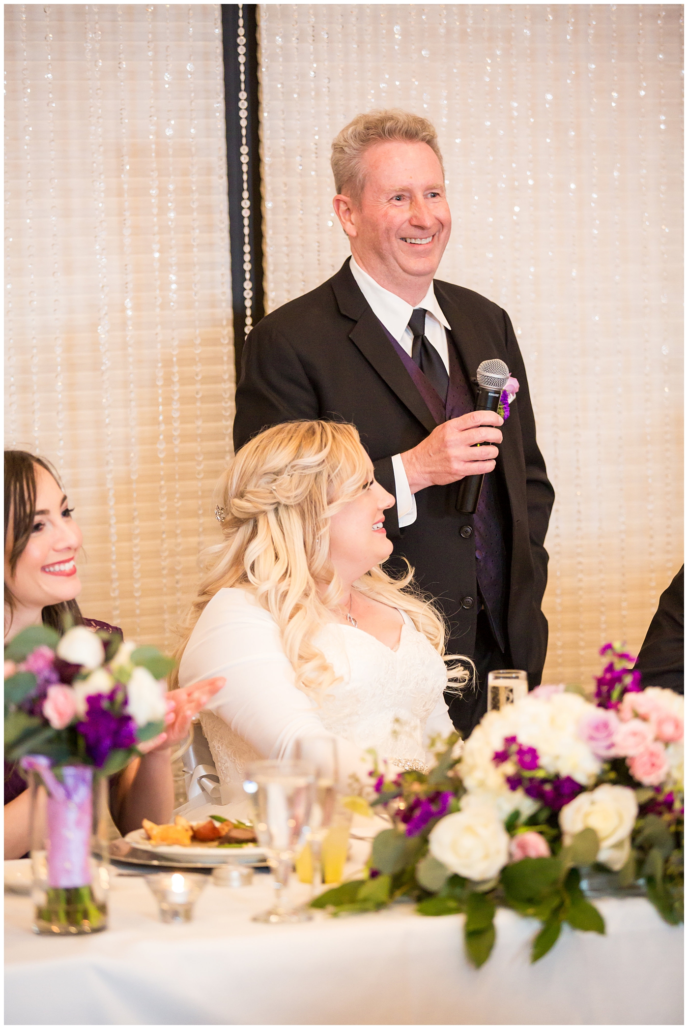 best man toast in ballroom wedding reception