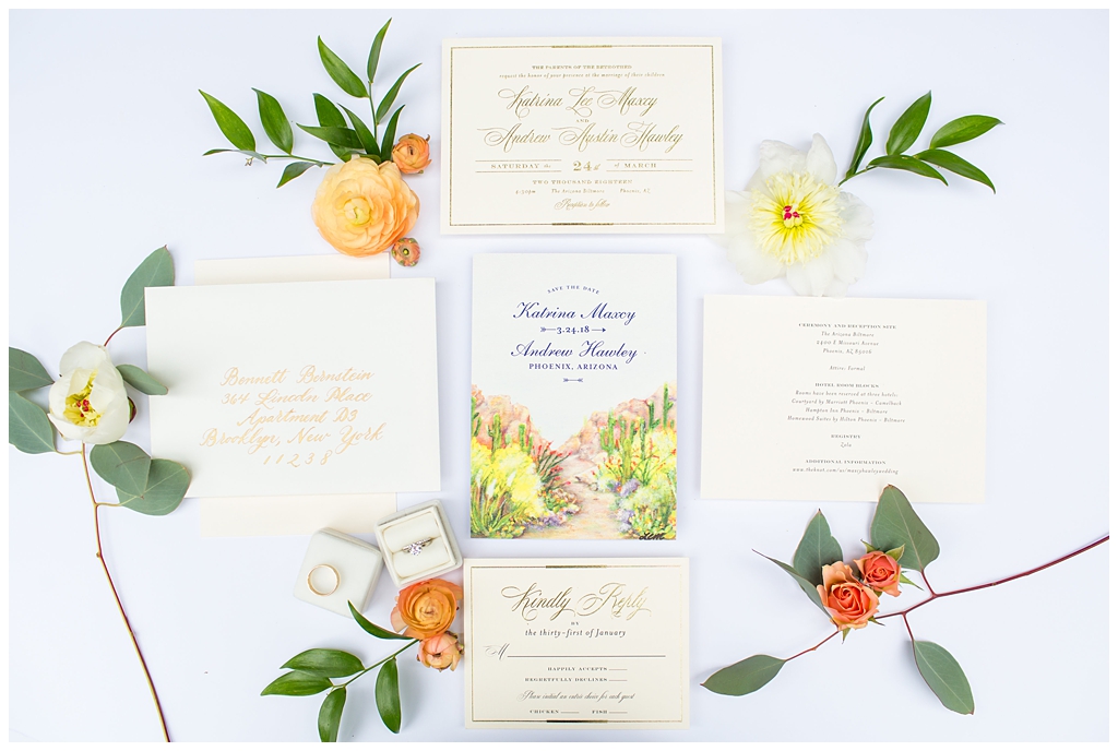 wedding invitation suite with white and cream desert landscape details