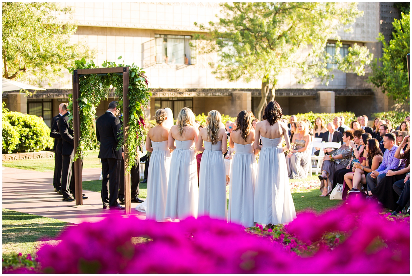 outdoor wedding ceremony on green lawn