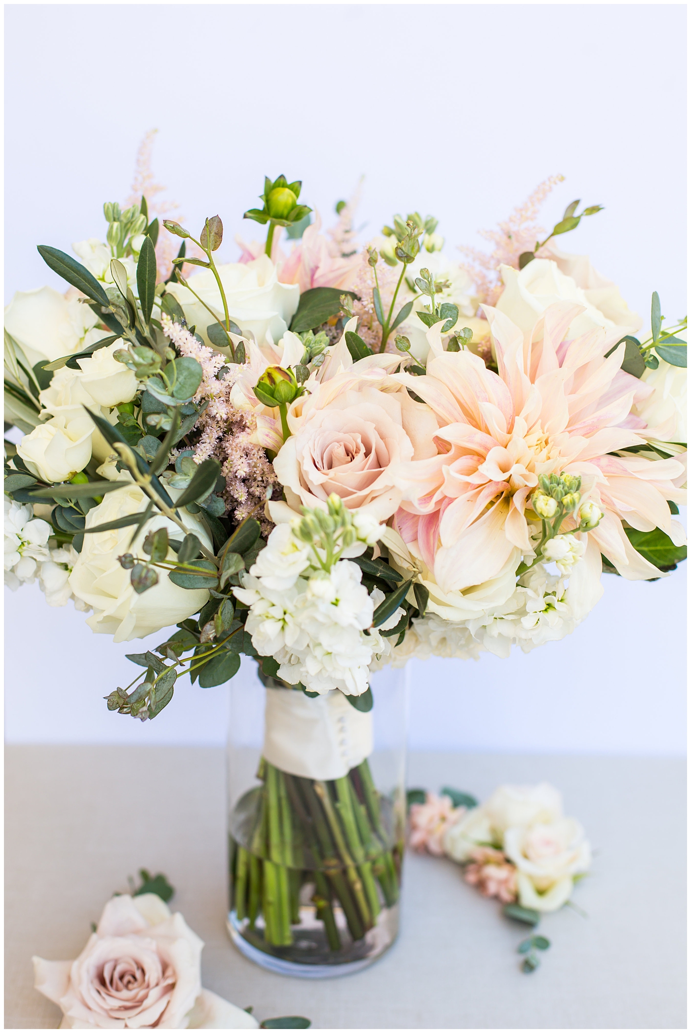 wildflower bridal bouquet with soft pink, blush, white, greenery flowers including roses, dahlias, snapdragons