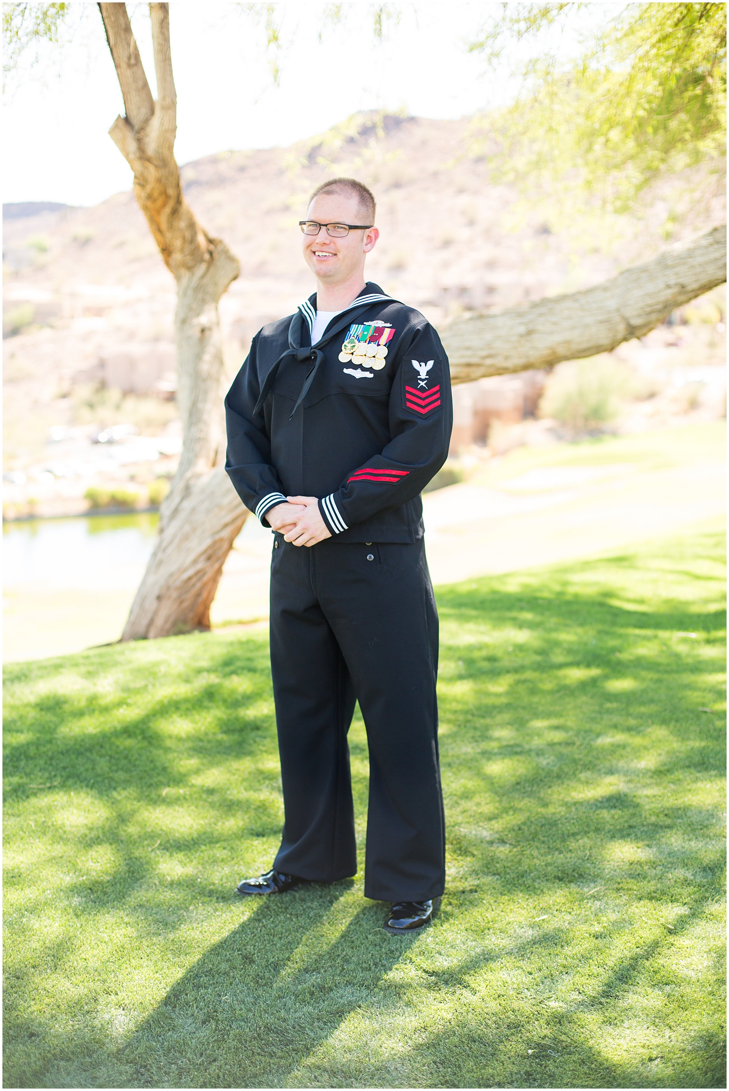 Groom in Navy dress uniform on wedding day