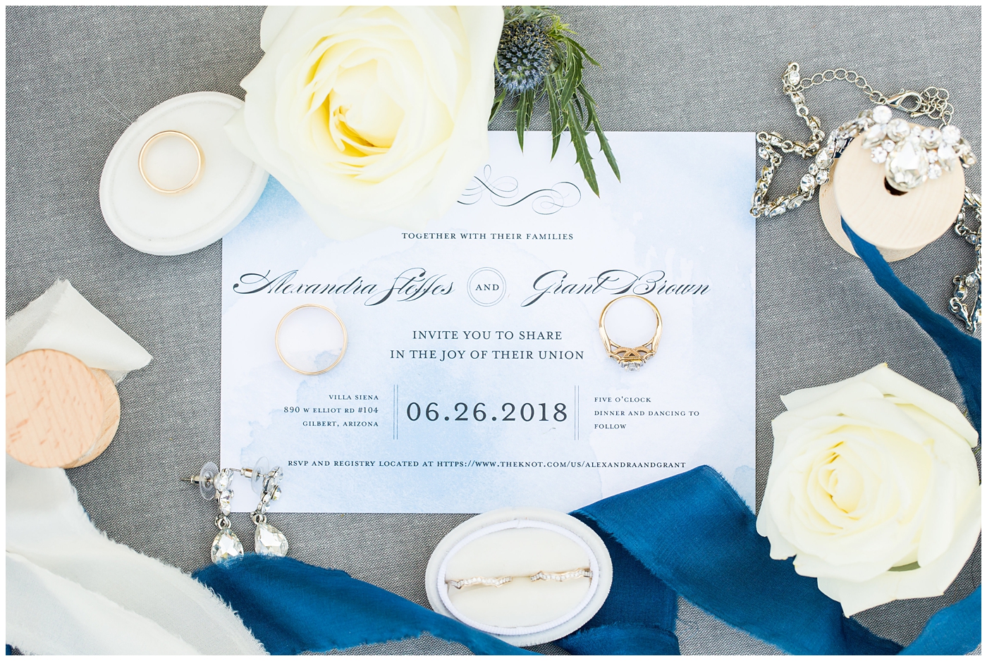 blue watercolor wedding invitation suite with rings and jewelry wedding detail shot