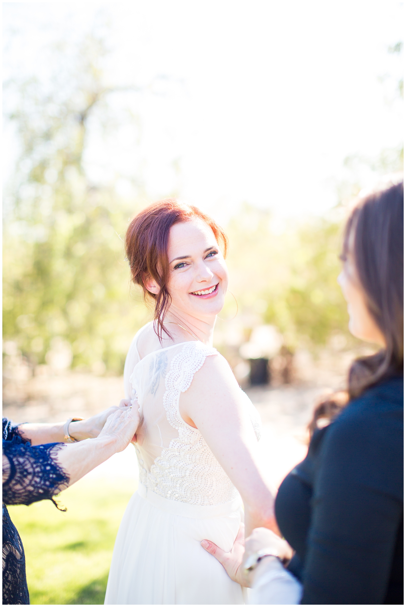 gorgeous red head bride getting ready