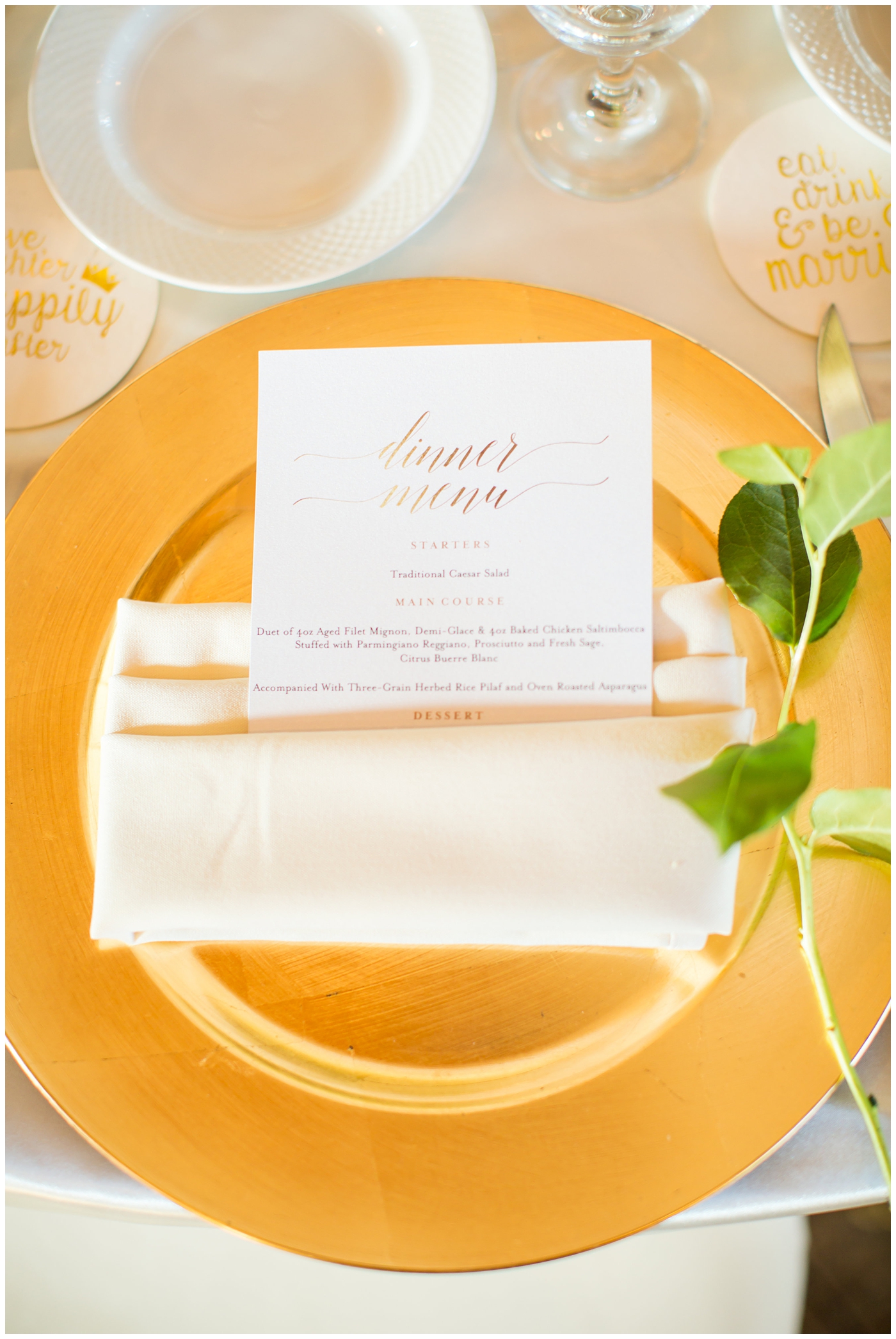 gold charger with ivory napkin on blush rose gold sequin linen for wedding reception
