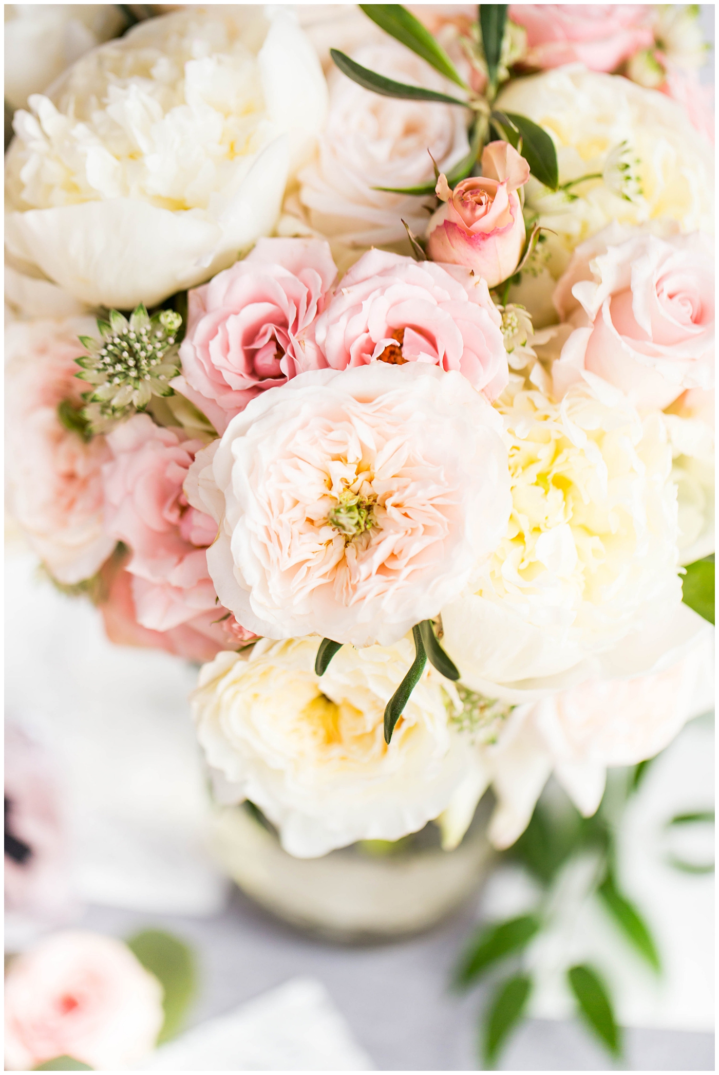pink and white roses and peonies wedding day bouquet