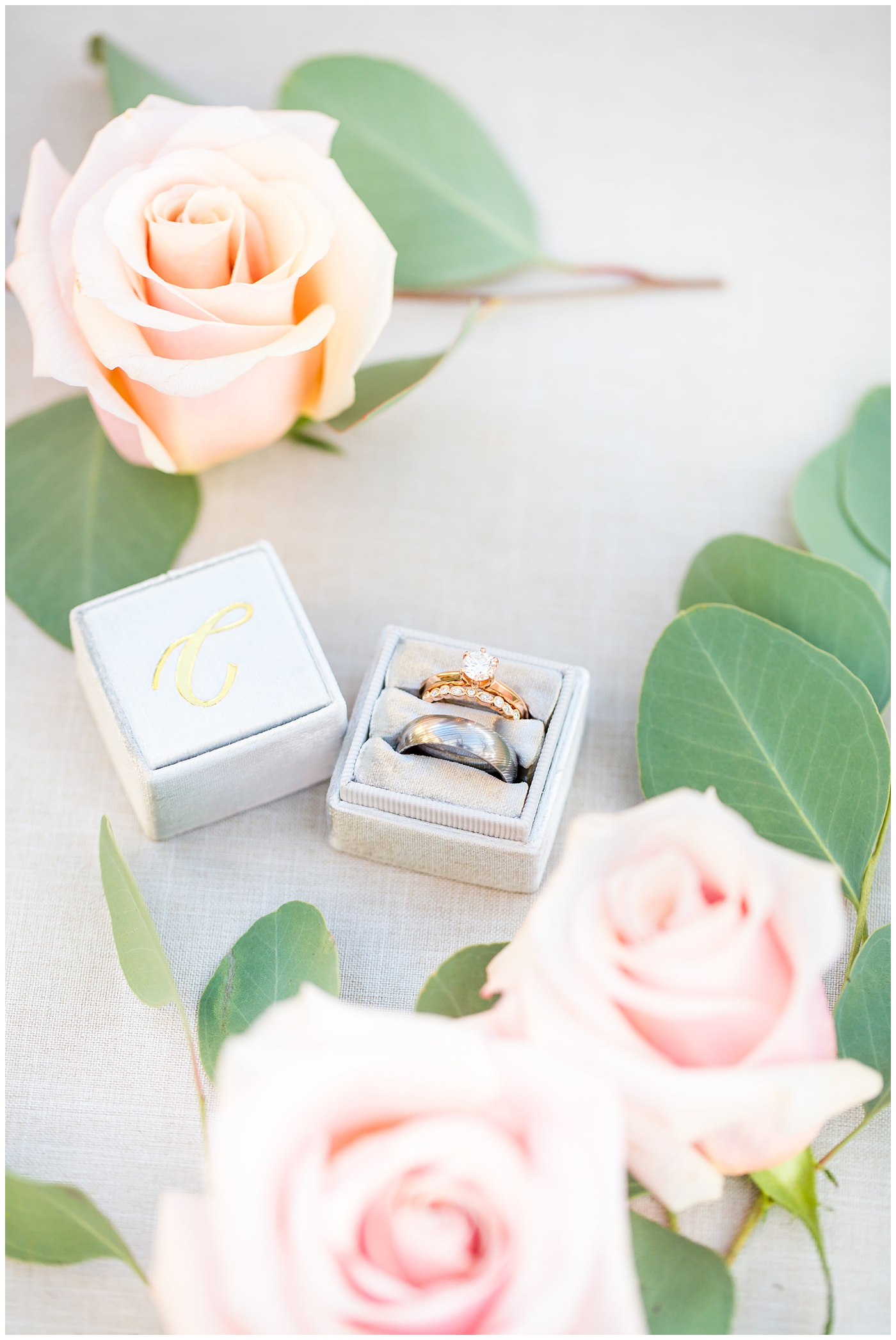 rose gold wedding bands and silver ring in gray mrs. box on wedding day details