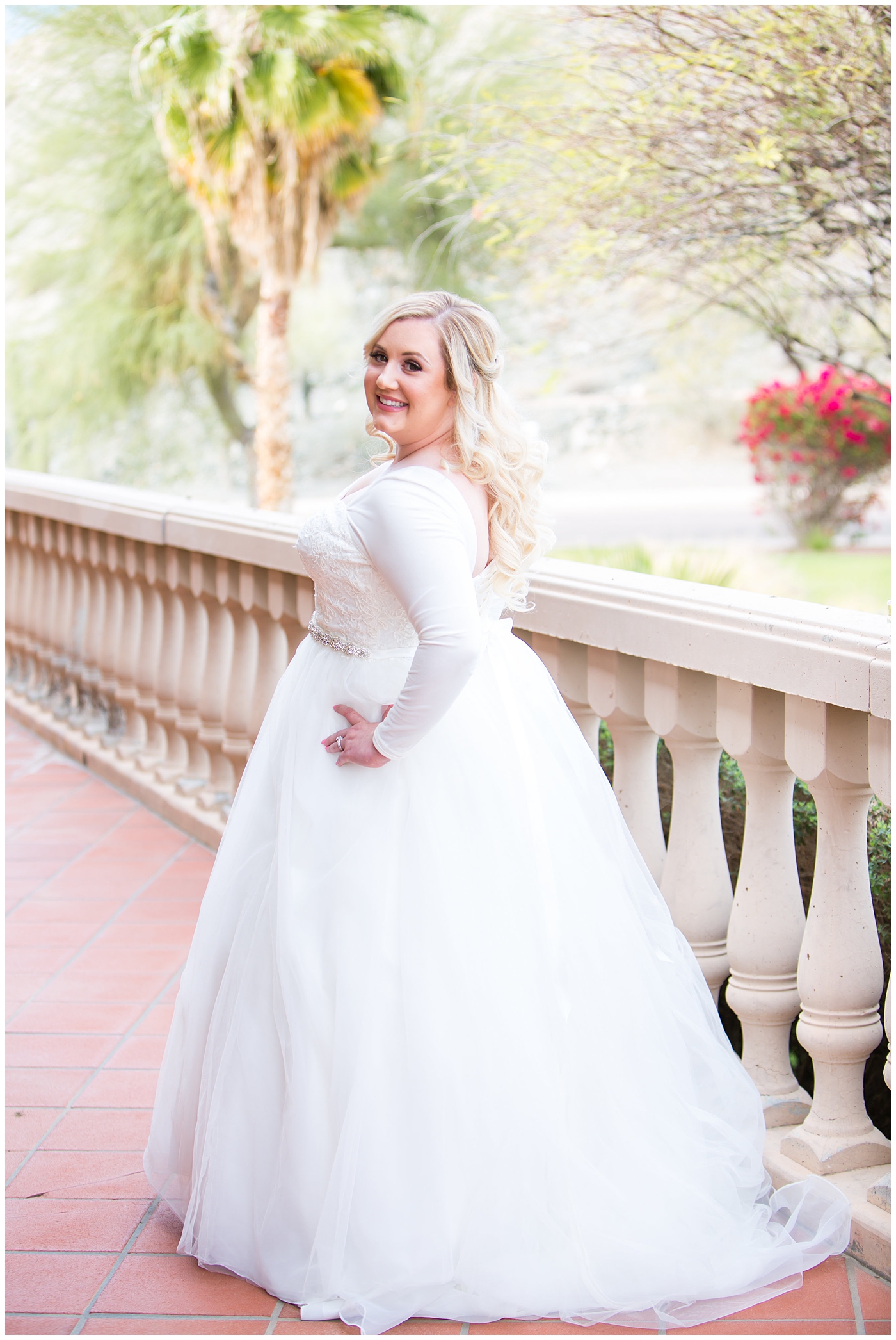 blonde bride in long sleeve wedding dress bridal portrait on wedding day