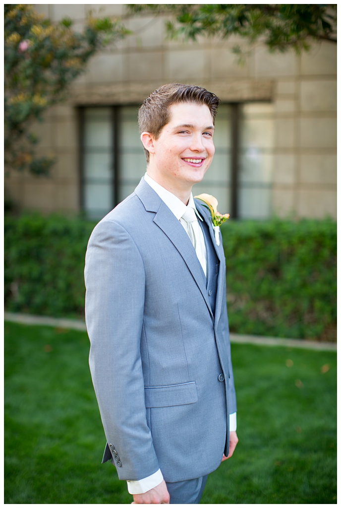 groom in light gray suit with tie portrait at Arizona Biltmore