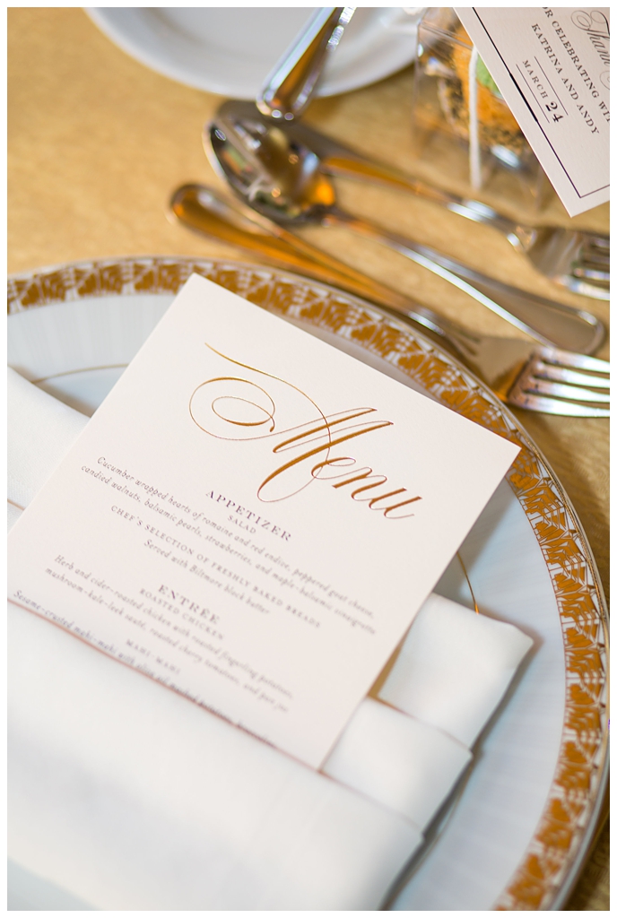 gold foil menu at wedding reception with gold tablecloths in gold room at arizona biltmore